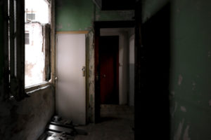 interior of an apartment with abandoned walls, ceilings and floors in the center of a European city interior of an apartment with abandoned walls, ceilings and floors in the center of a European city